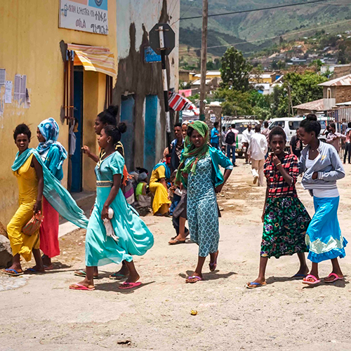 group of women walking in street in Aksum, Ethiopia