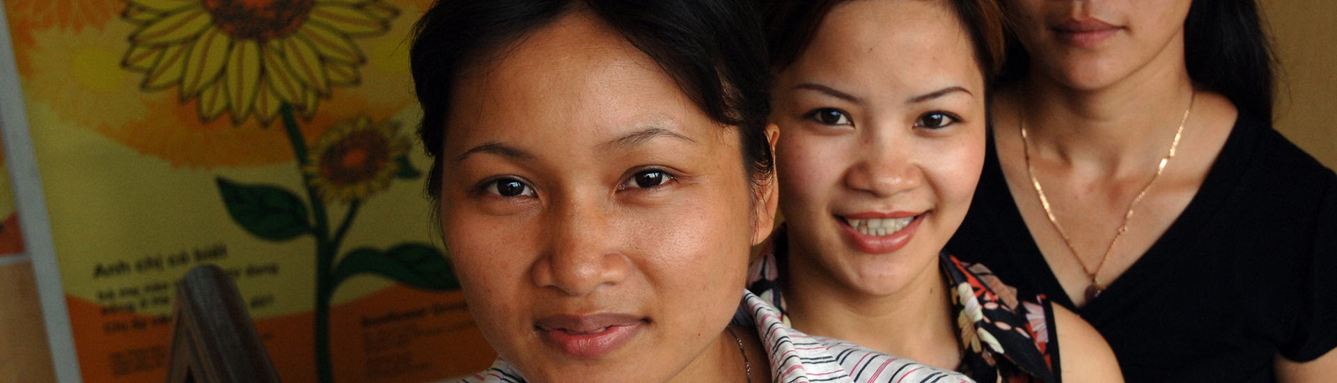 Members of the Sunflower Group L to R Huag, Lan and Hai. These woman are members of a group of 200 women who support and educate women about HIV/AIDS in Hanoi. Vietnam 2006.