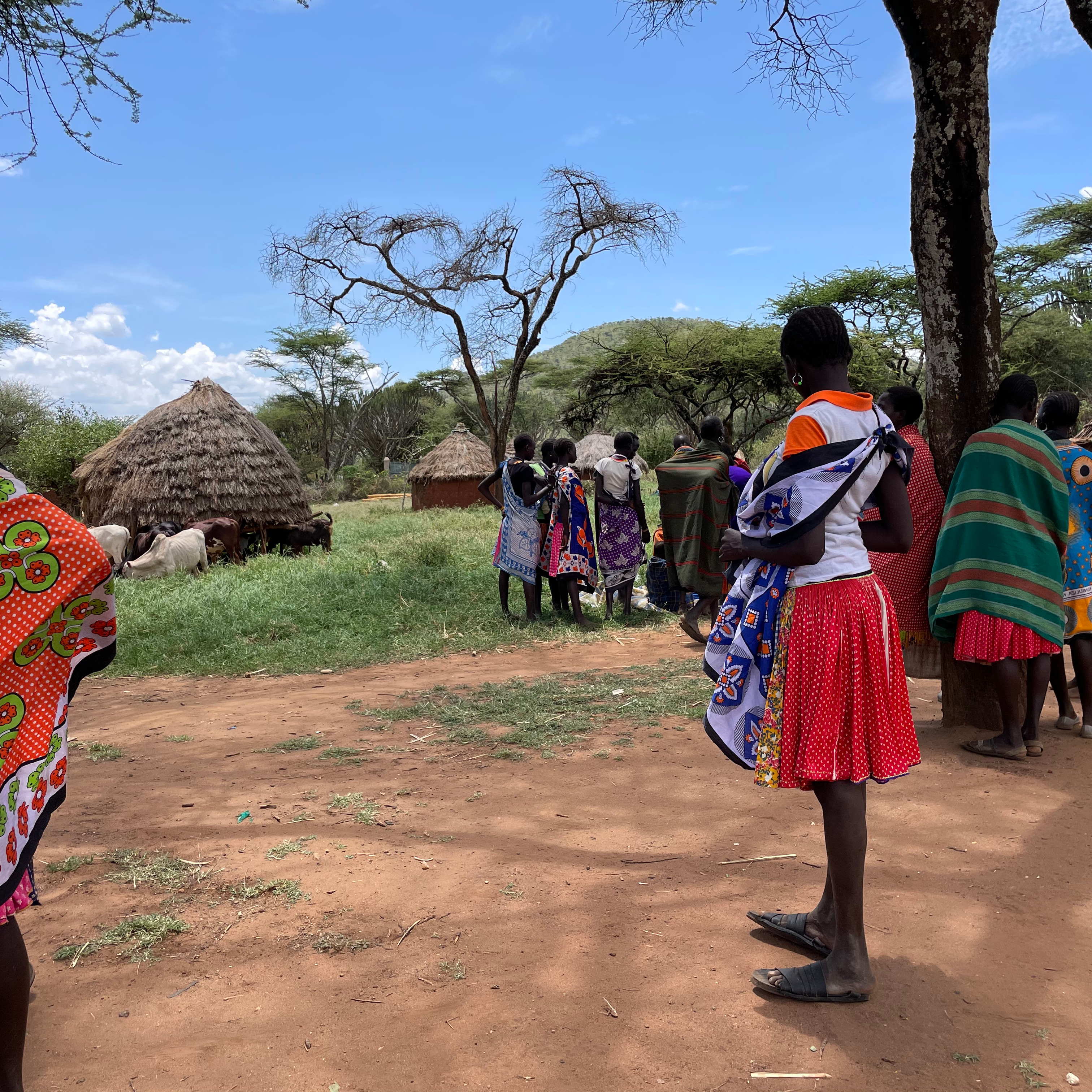 Women standing outdoors at Apolou