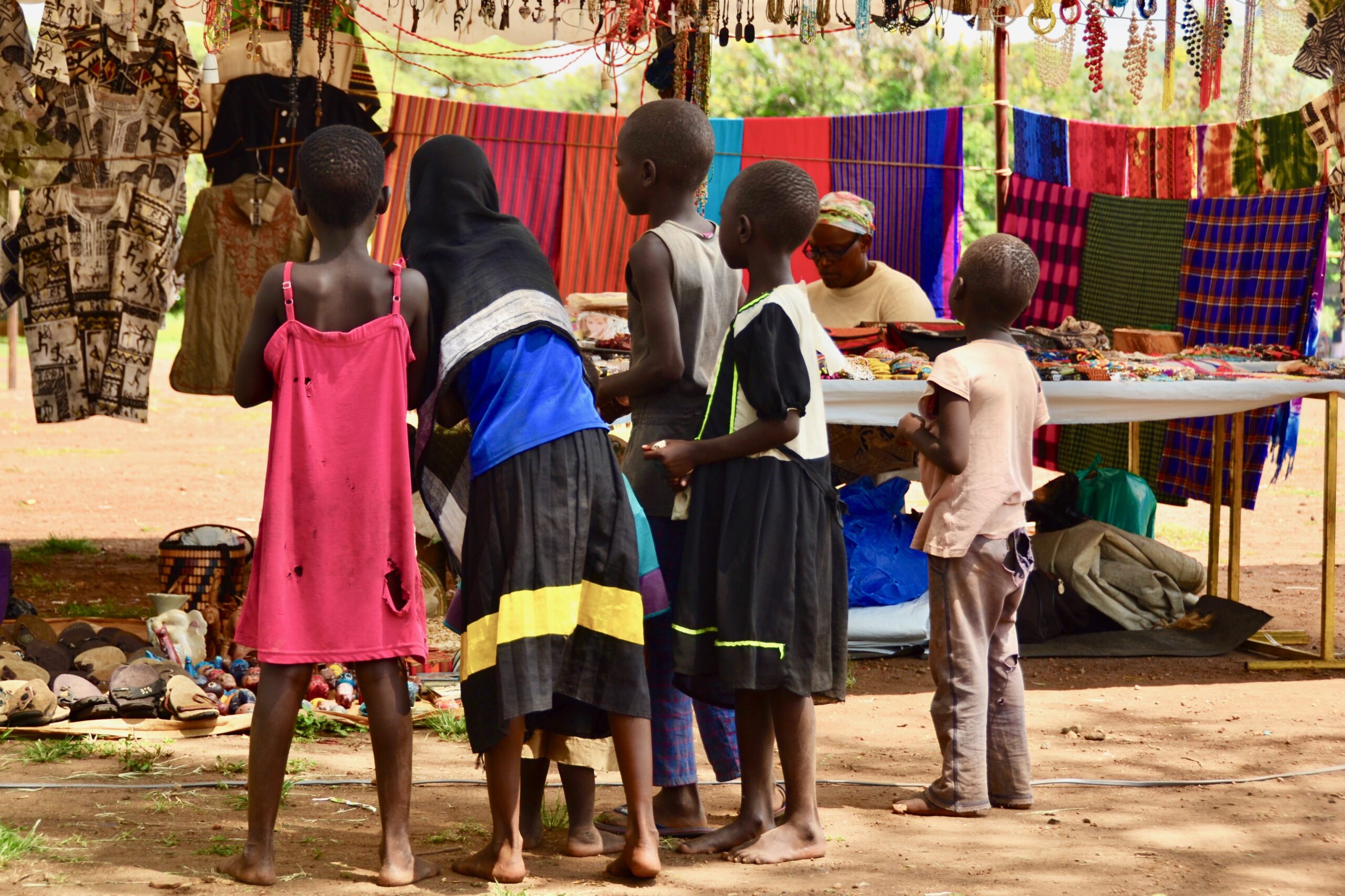 Children at a market in Uganda