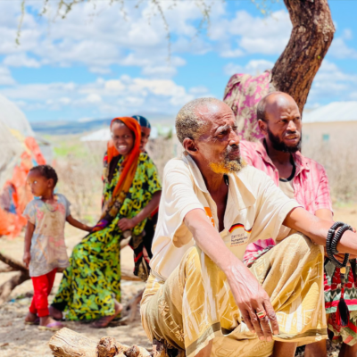 Male elders of displaced community, Goljano