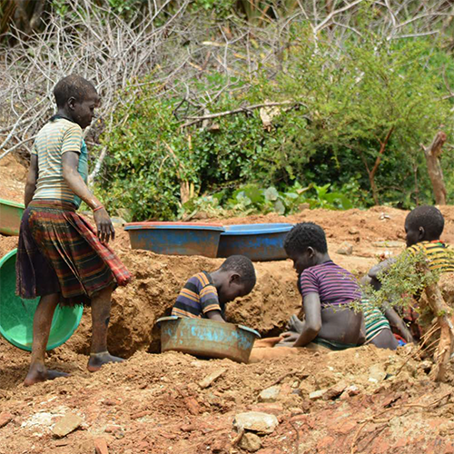 Girls working to mine gold, Karamoja, Uganda. Photo courtesy of Karamoja Development Forum